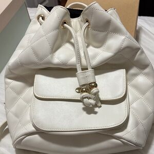 Elegant White Quilted Backpack